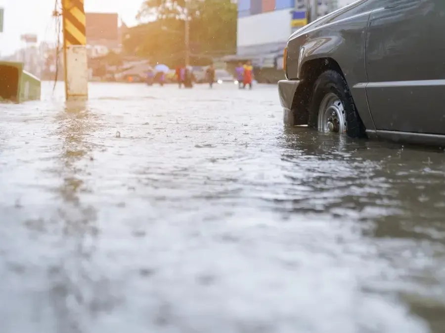 Flash flood water covering a street after a thunderstorm near Duluth